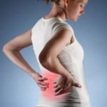 Woman in back pain